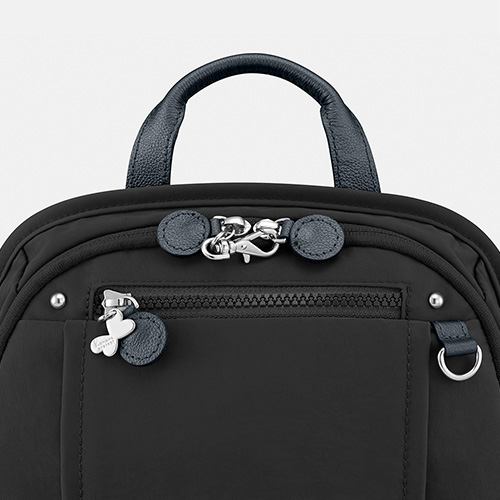 The main compartment zipper has a safety lock.
