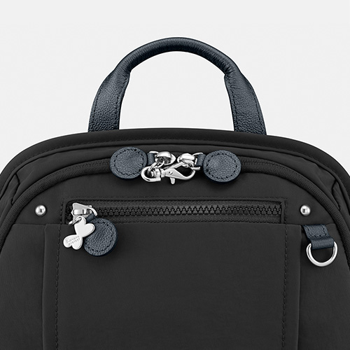 The main compartment zipper has a safety lock.